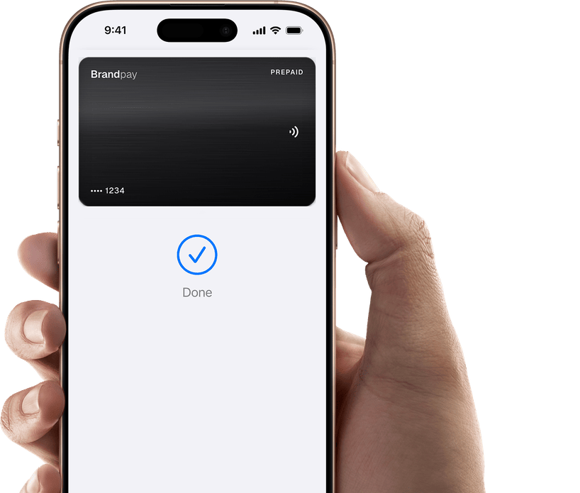 An iPhone held in a hand showing the BrandPay card with a Done confirmation